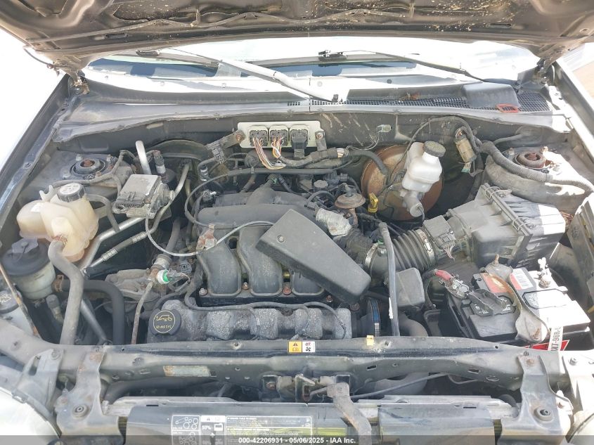 2005 Ford Escape Limited VIN: 1FMYU04105KE00884 Lot: 42206931