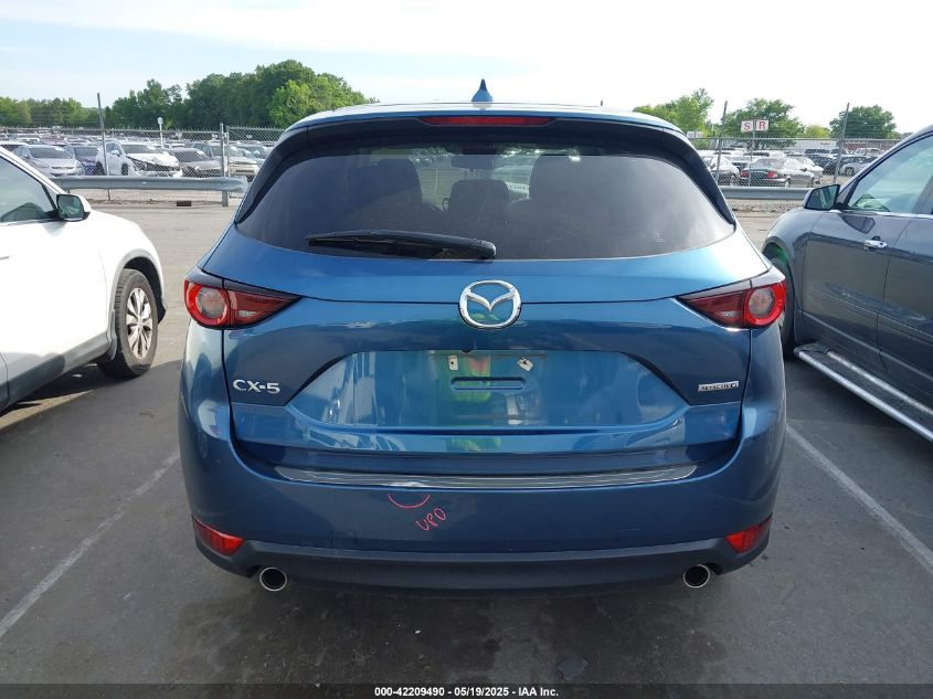 2021 Mazda Cx-5 Touring VIN: JM3KFACM1M0460101 Lot: 42209490