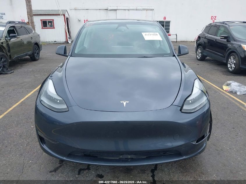 2023 Tesla Model Y Awd/Long Range Dual Motor All-Wheel Drive VIN: 7SAYGDEE4PF806349 Lot: 42217660