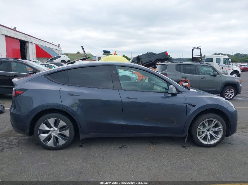 2023 Tesla Model Y Awd/Long Range Dual Motor All-Wheel Drive VIN: 7SAYGDEE4PF806349 Lot: 42217660