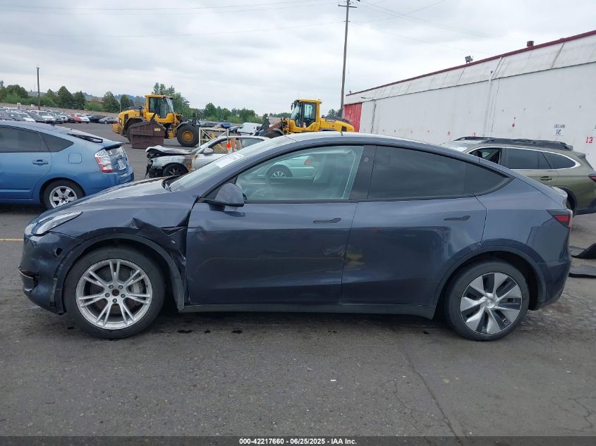 2023 Tesla Model Y Awd/Long Range Dual Motor All-Wheel Drive VIN: 7SAYGDEE4PF806349 Lot: 42217660