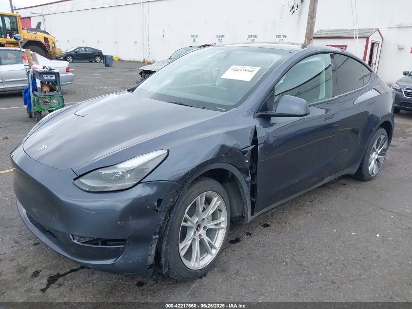 2023 Tesla Model Y Awd/Long Range Dual Motor All-Wheel Drive VIN: 7SAYGDEE4PF806349 Lot: 42217660