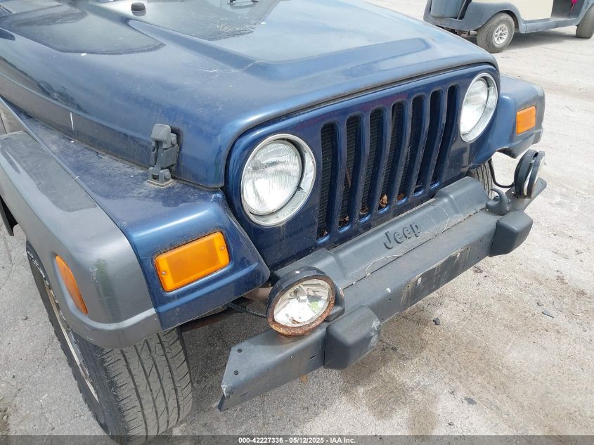2004 Jeep Wrangler VIN: 1J4FA39F64P726711 Lot: 42227336