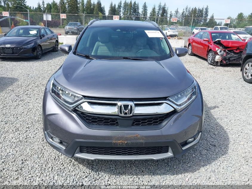 2017 Honda Cr-V Touring VIN: 5J6RW1H90HL008702 Lot: 42229174