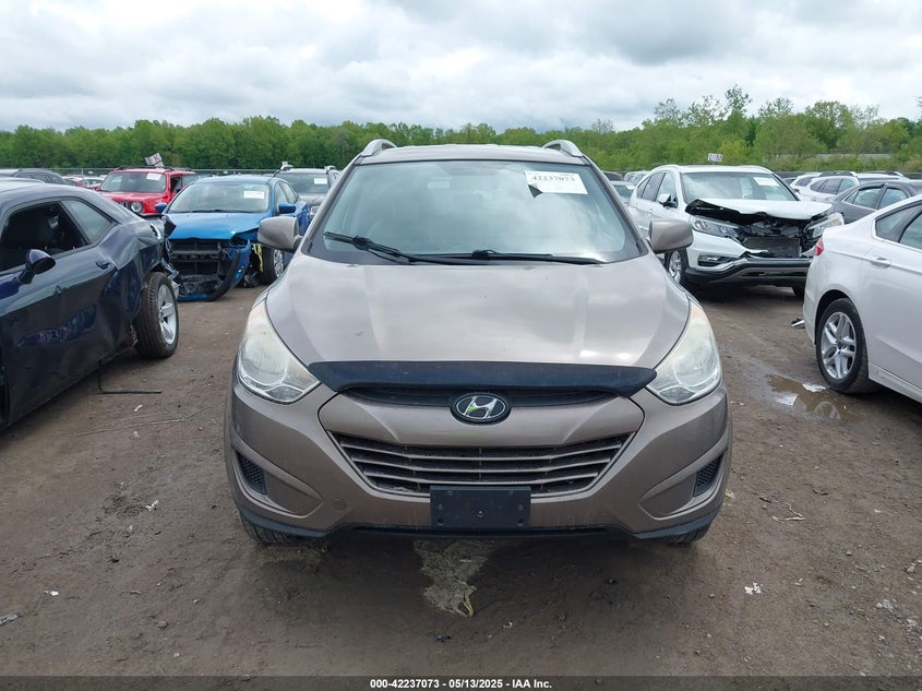 2011 HYUNDAI TUCSON VIN: KM8JU3AC1BU169390