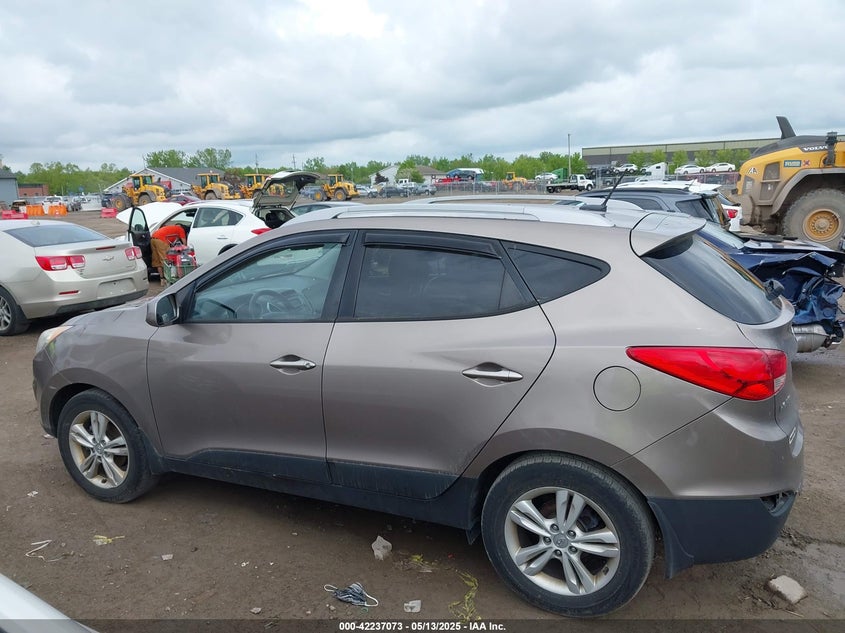 2011 HYUNDAI TUCSON VIN: KM8JU3AC1BU169390