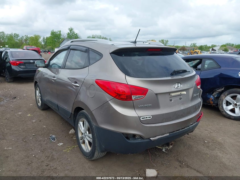2011 HYUNDAI TUCSON VIN: KM8JU3AC1BU169390