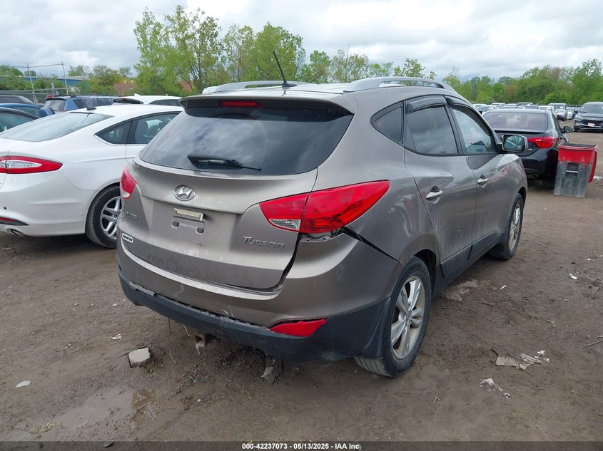 2011 HYUNDAI TUCSON VIN: KM8JU3AC1BU169390