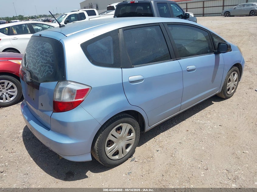 2009 HONDA FIT VIN: JHMGE882X9S008434