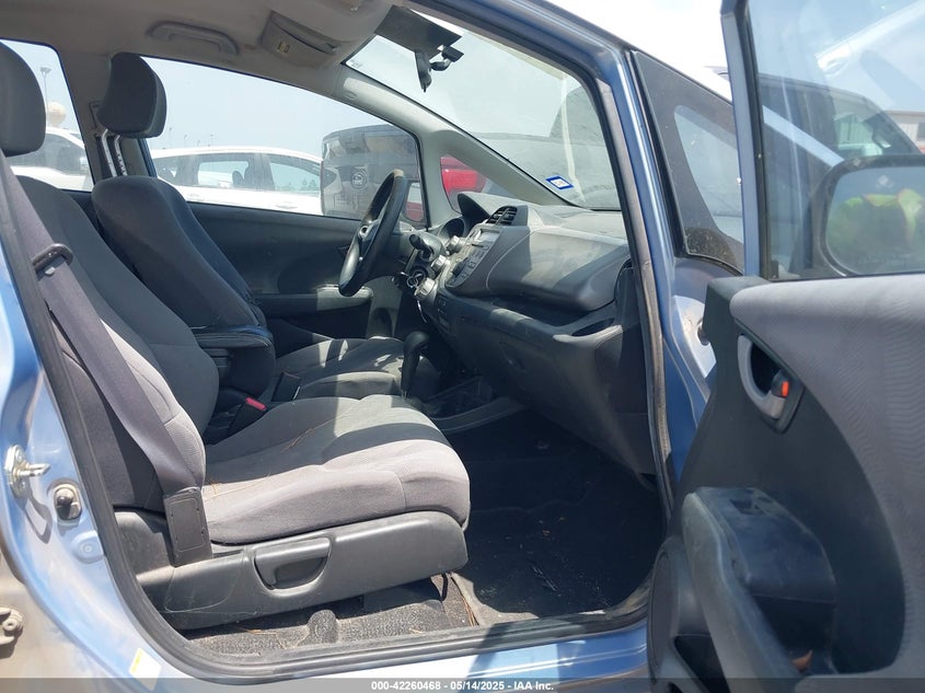 2009 HONDA FIT VIN: JHMGE882X9S008434