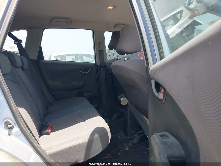 2009 HONDA FIT VIN: JHMGE882X9S008434