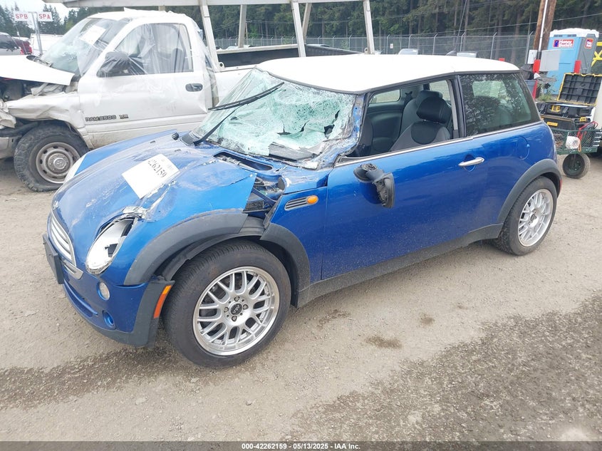 2006 MINI COOPER VIN: WMWRC33576TK64005