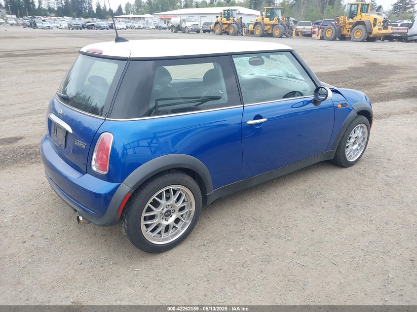 2006 MINI COOPER VIN: WMWRC33576TK64005