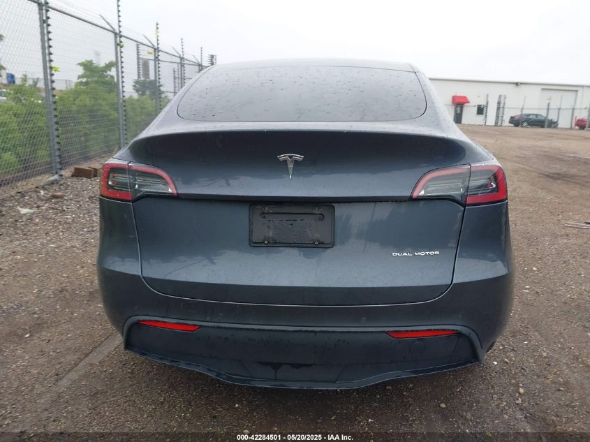 2023 Tesla Model Y Awd/Long Range Dual Motor All-Wheel Drive VIN: 7SAYGAEE1PF584206 Lot: 42284501