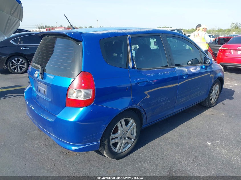 2007 HONDA FIT VIN: JHMGD38637S015957