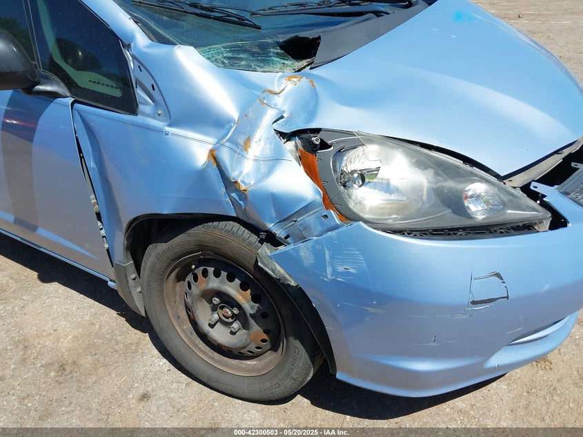2009 HONDA FIT VIN: JHMGE88209S011973