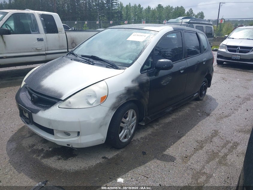 2007 HONDA FIT VIN: JHMGD38657S024112