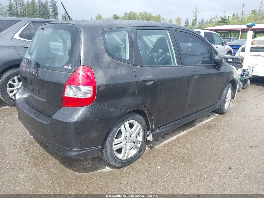 2007 HONDA FIT VIN: JHMGD38657S024112
