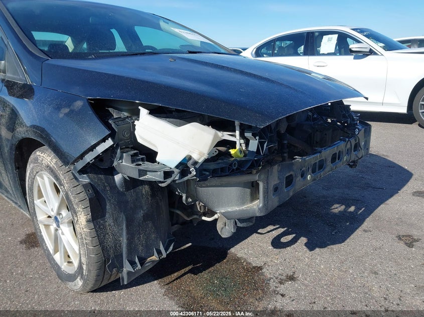 2015 FORD FOCUS VIN: 1FADP3F21FL385654