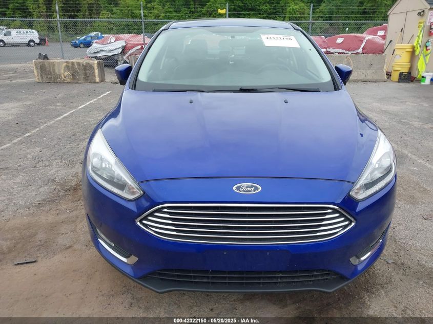 2015 Ford Focus Titanium VIN: 1FADP3J28FL380815 Lot: 42322150