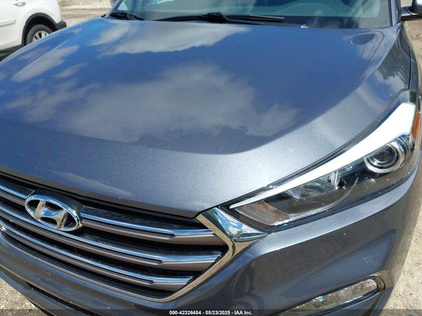 2016 HYUNDAI TUCSON LIMITED/SPORT AND ECO/SE - KM8J3CA26GU033662