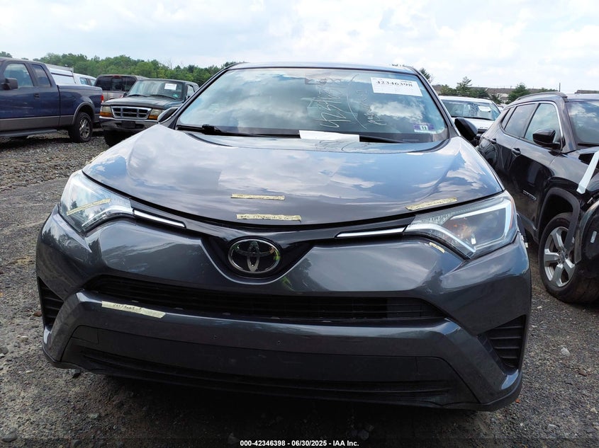 VIN: JTMBFREVXJJ730283 2018 TOYOTA RAV4 LE