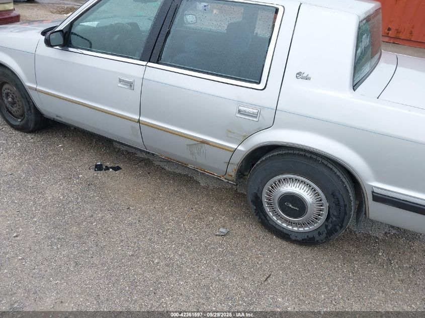 1990 Chrysler Salon VIN: 1C3XC46RXLD748940 Lot: 42361597