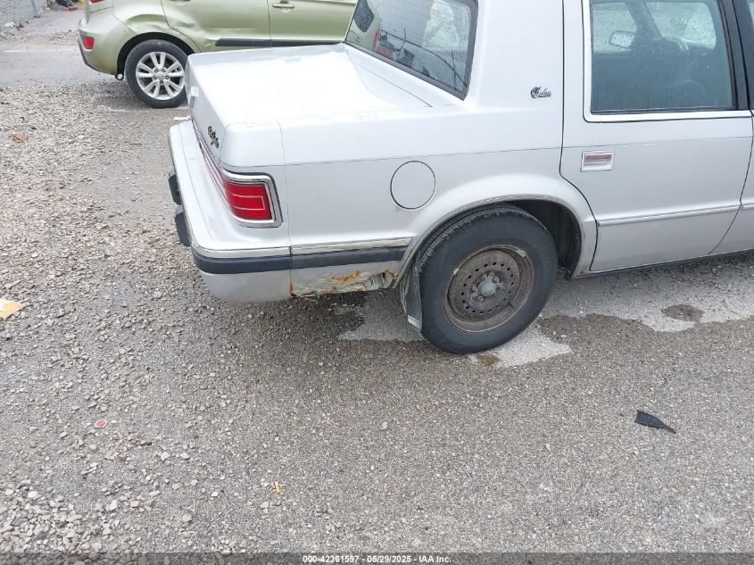 1990 Chrysler Salon VIN: 1C3XC46RXLD748940 Lot: 42361597