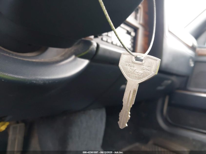 1990 Chrysler Salon VIN: 1C3XC46RXLD748940 Lot: 42361597