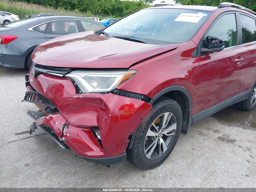 2018 TOYOTA RAV4 VIN: 2T3RFREV2JW839921
