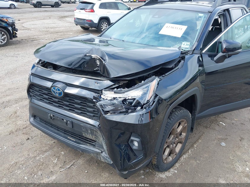 VIN 2T3UWRFV7PW163872 2023 TOYOTA RAV4 HYBRID WOODLAND EDITION