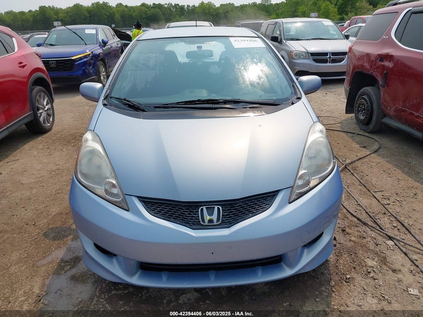 2009 HONDA FIT VIN: JHMGE88629S023819