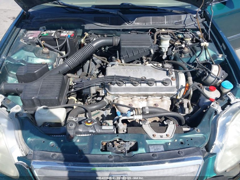 2000 Honda Civic Lx VIN: 1HGEJ6571YL067035 Lot: 42394924