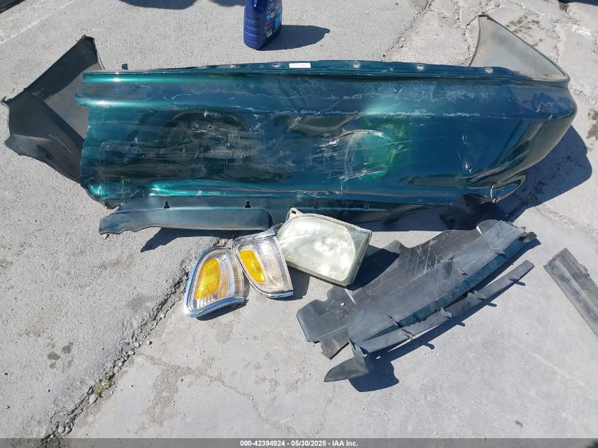 2000 Honda Civic Lx VIN: 1HGEJ6571YL067035 Lot: 42394924