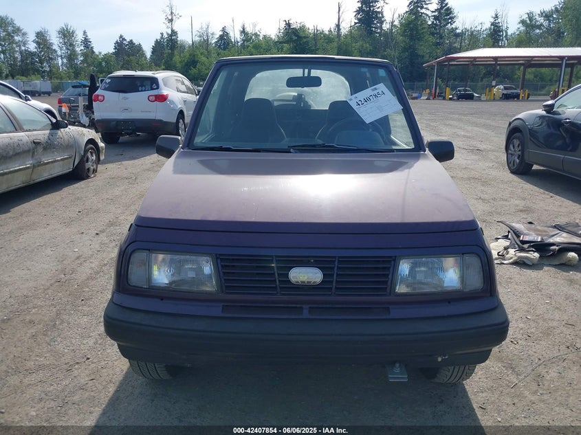 1995 Geo Tracker VIN: 2CNBE18U9S6924854 Lot: 42407854