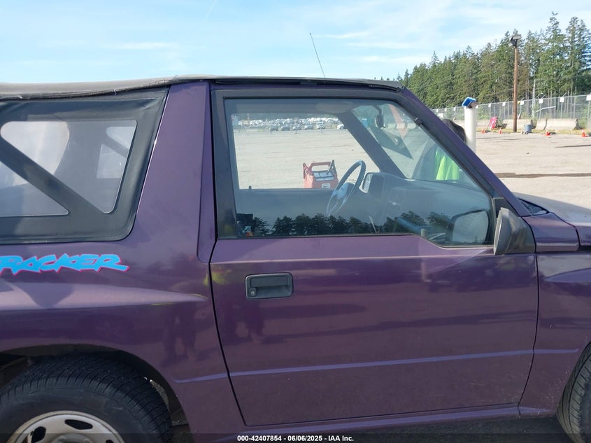 1995 Geo Tracker VIN: 2CNBE18U9S6924854 Lot: 42407854