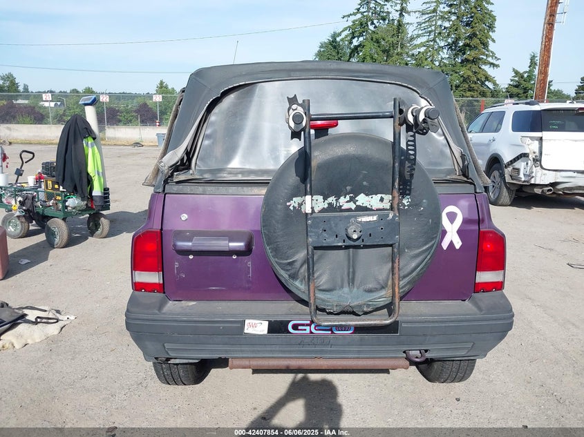 1995 Geo Tracker VIN: 2CNBE18U9S6924854 Lot: 42407854