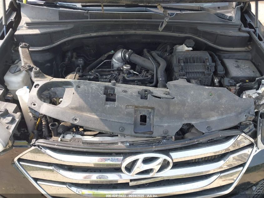 2016 Hyundai Santa Fe Sport 2.0L Turbo VIN: 5XYZWDLA2GG310074 Lot: 42410423