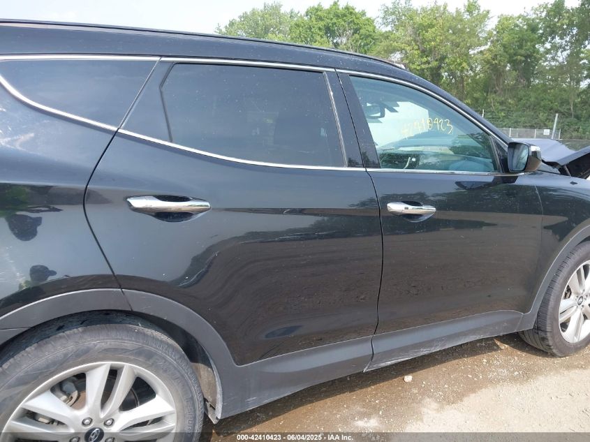 2016 Hyundai Santa Fe Sport 2.0L Turbo VIN: 5XYZWDLA2GG310074 Lot: 42410423