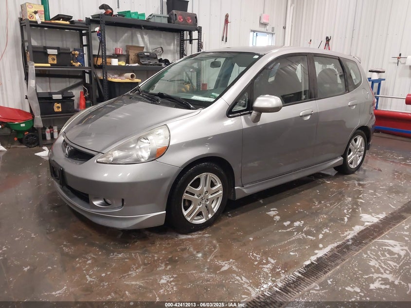 2007 HONDA FIT VIN: JHMGD37677S024047