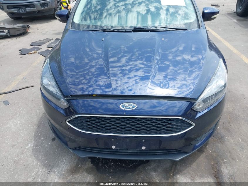 2016 Ford Focus Titanium VIN: 1FADP3N25GL239552 Lot: 42427097
