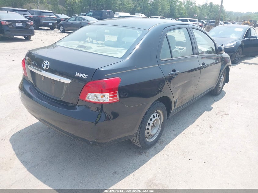 2009 TOYOTA YARIS VIN: JTDBT903091299706