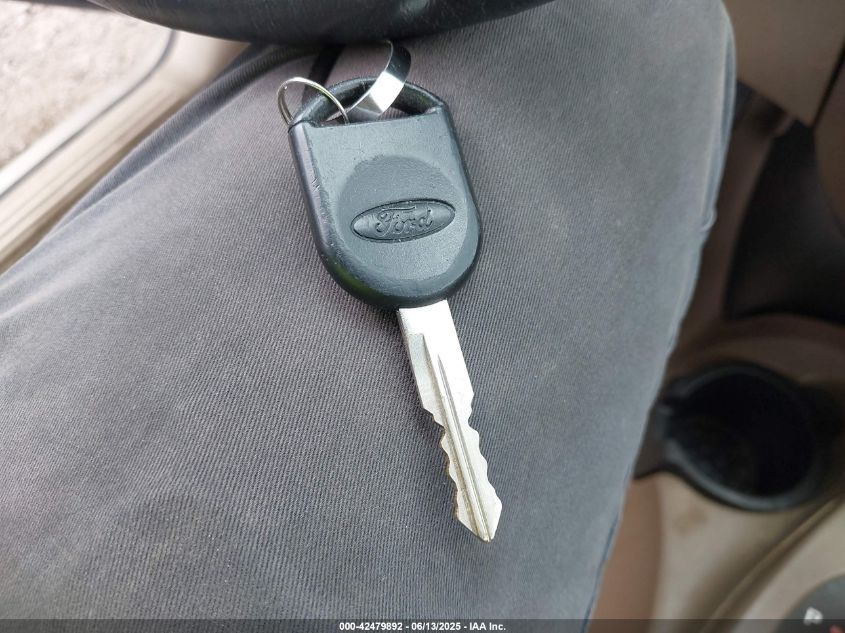 2007 Ford Focus Se/Ses VIN: 1FAFP36N17W229018 Lot: 42479892