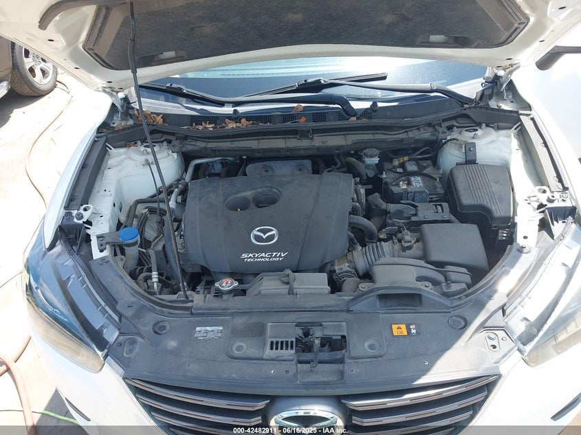 2016 Mazda Cx-5 Touring VIN: JM3KE2CY8G0655211 Lot: 42482911