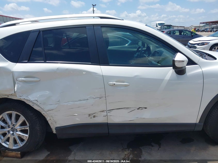 2016 Mazda Cx-5 Touring VIN: JM3KE2CY8G0655211 Lot: 42482911