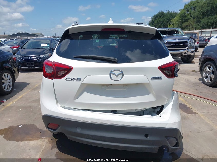 2016 Mazda Cx-5 Touring VIN: JM3KE2CY8G0655211 Lot: 42482911