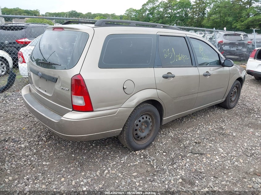 1FAFP36N115W21462 2001 FORD FOCUS photo no. 4