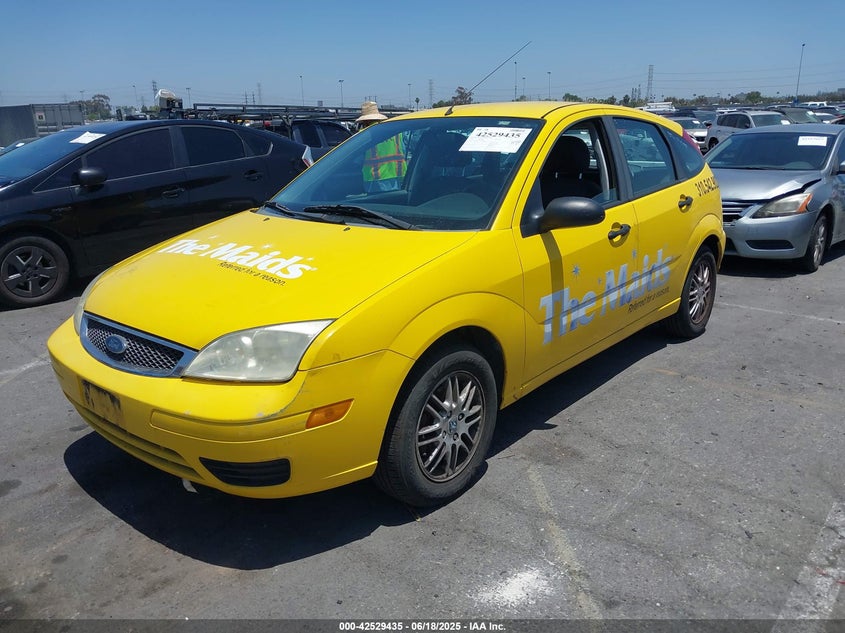 2006 Ford Focus Zx5 yellow hatchback gasoline 1FAFP37N36W185388 photo #3