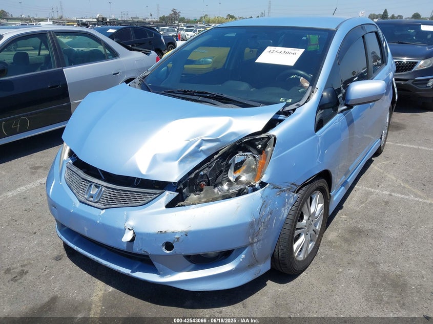 2009 HONDA FIT VIN: JHMGE88439S007689