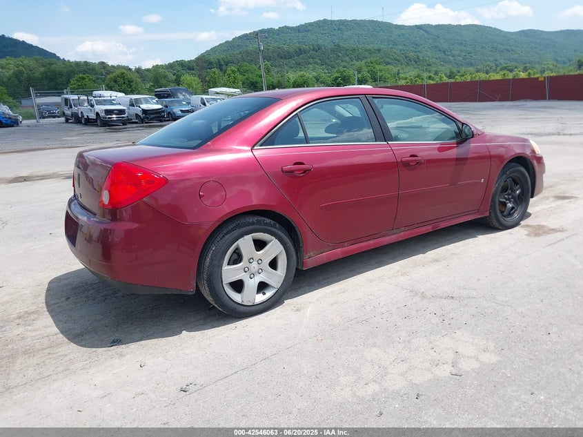 2009 PONTIAC G6 NEW VIN: 1G2ZJ57B994230042